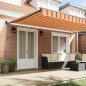 vidaXL Tenda da sole automatica retrattile crema e arancione 500x300 cm